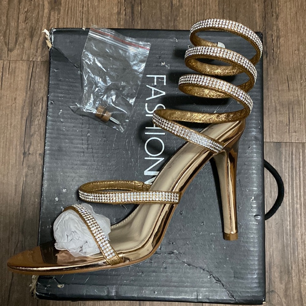 Rose gold, around calf slightly used heels, no rhinestones missing